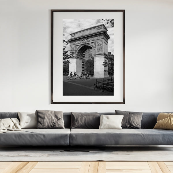 MEN ON BICYCLES IN WASHINGTON SQUARE PARK