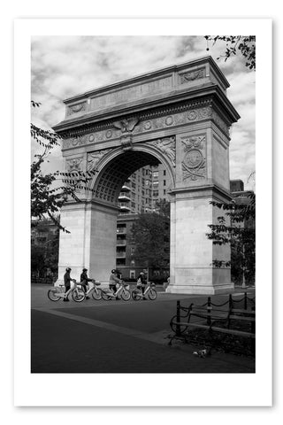 MEN ON BICYCLES IN WASHINGTON SQUARE PARK